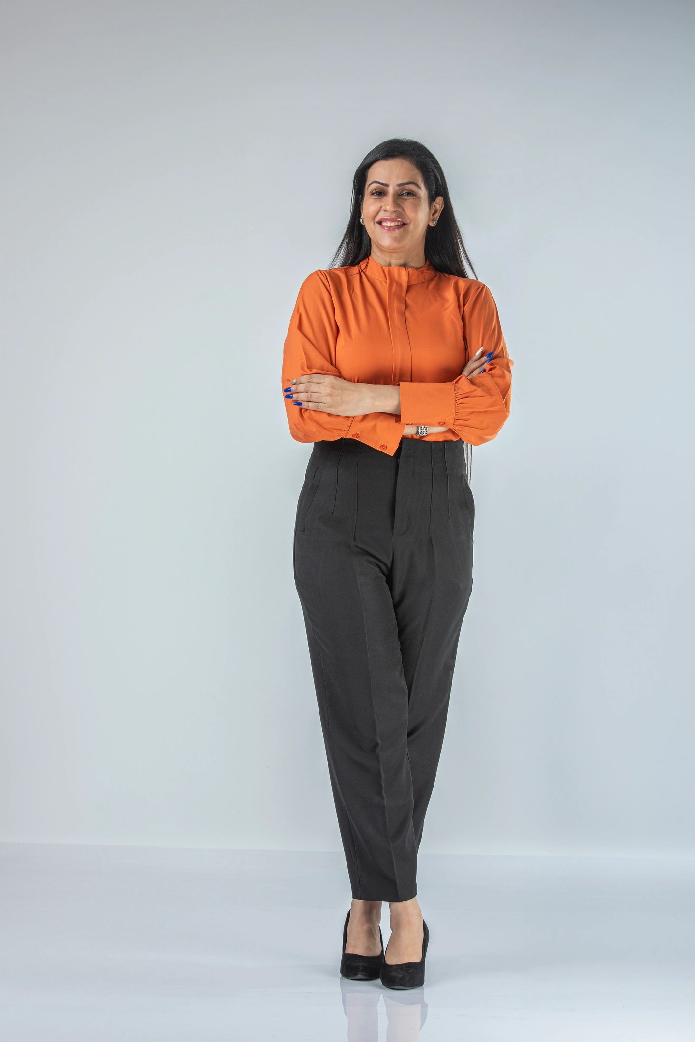 Professional portrait representing director Anila Sojan