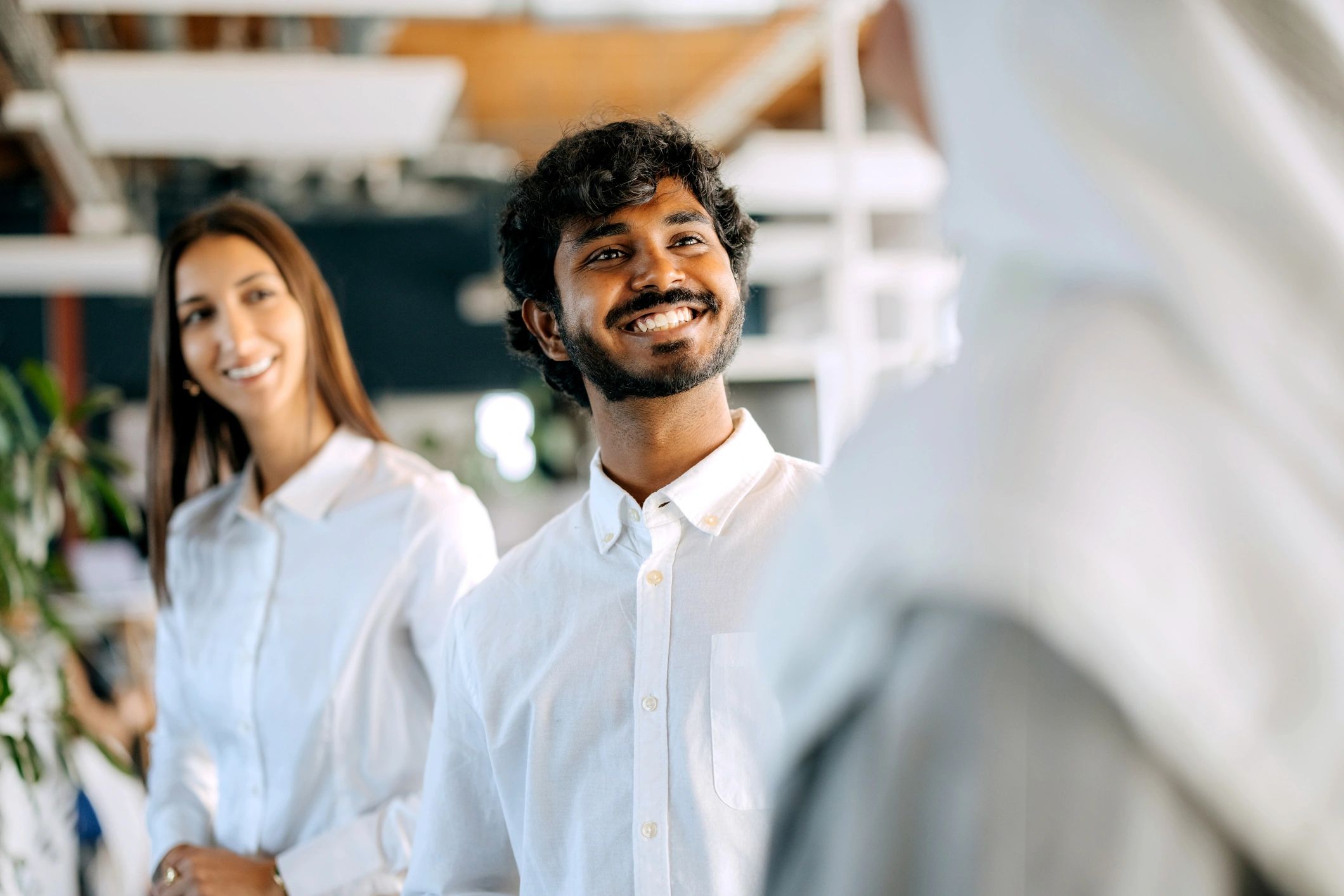 Corporate team collaborating in a modern office